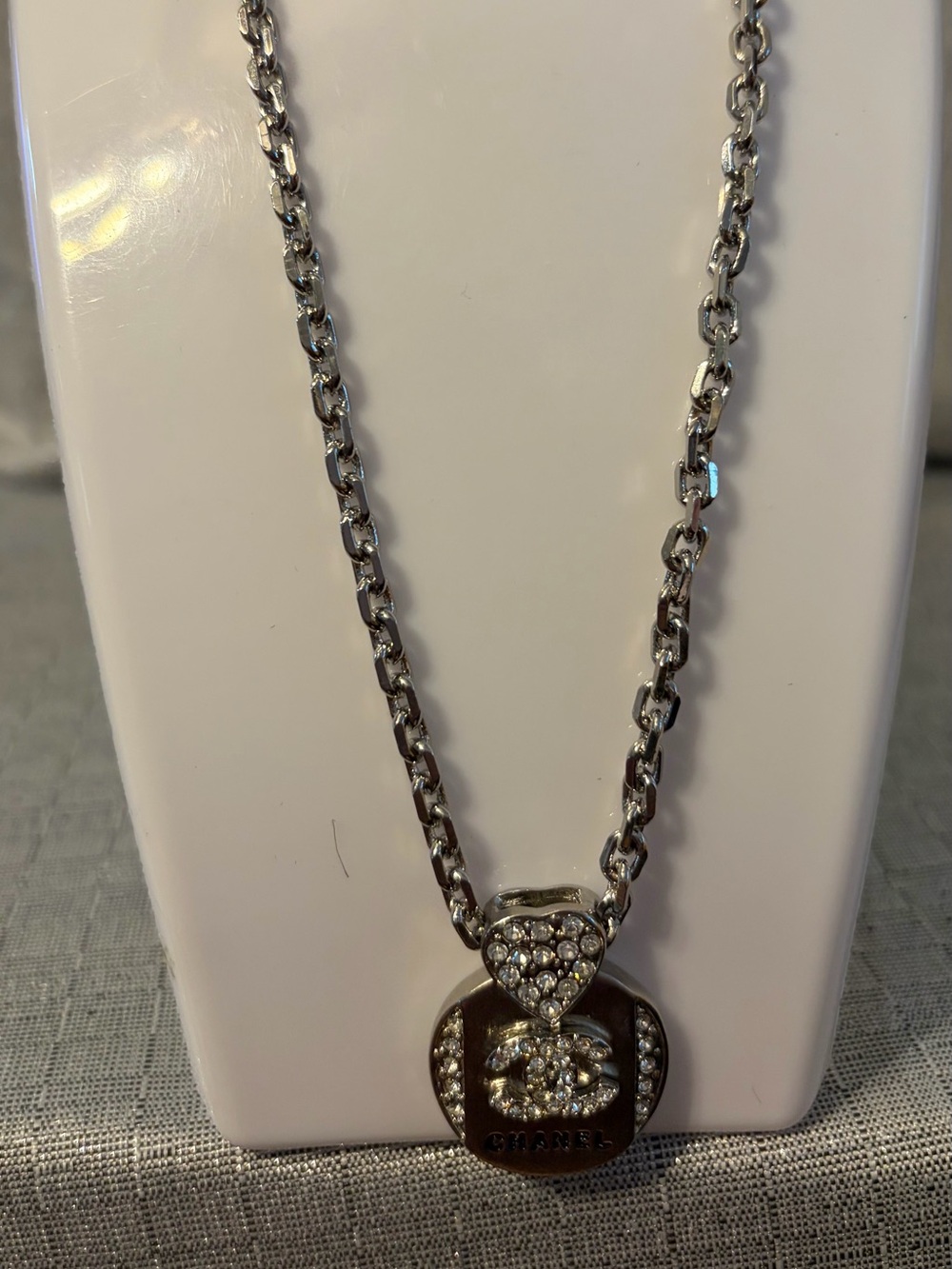 Silver Crystal Disc Pendant Necklace with Heart Bail